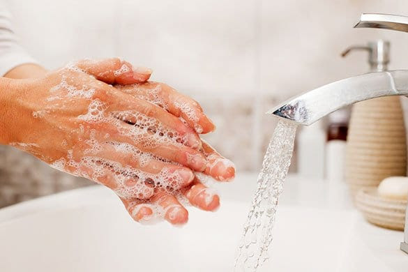 Hand Washing in Sink